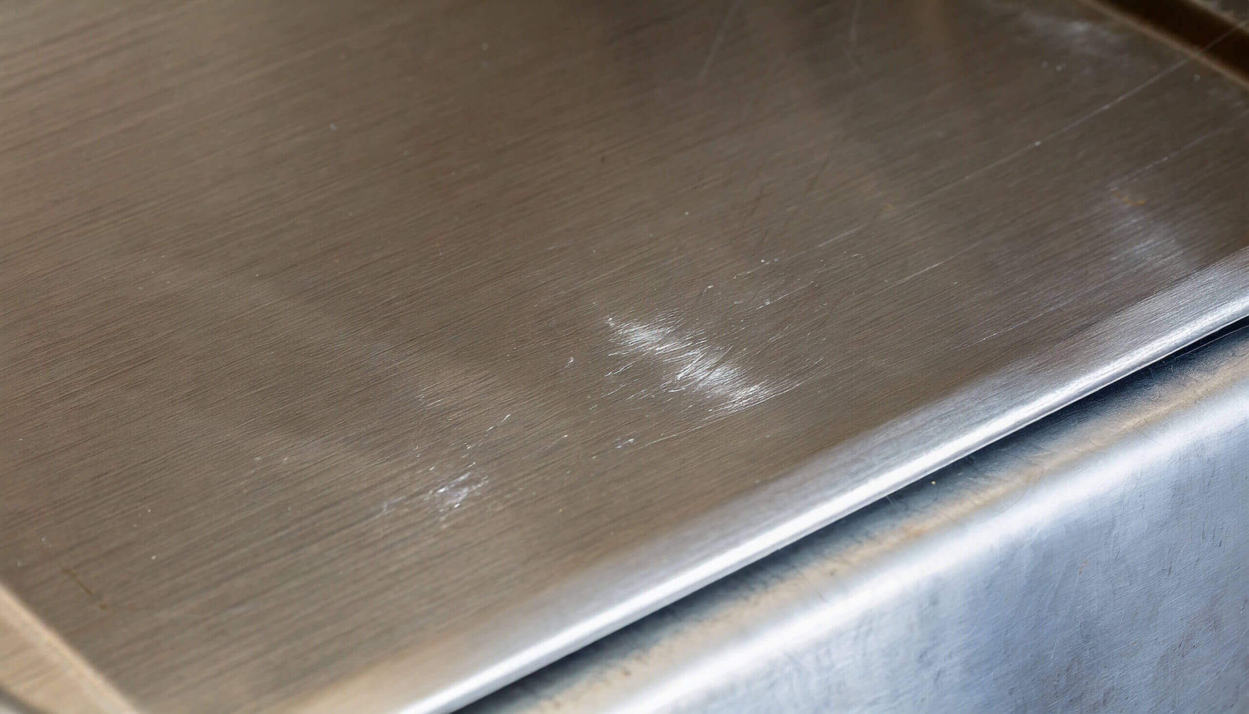 Scuff Mark Steel Products to Remove Scratches From Stainless Steel